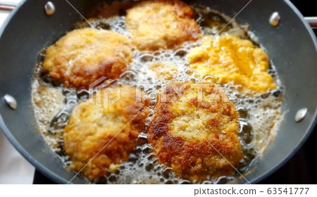 Frying a Minced Meat Pork Steak Frying a Minced Meat Pork Steak 63541777
