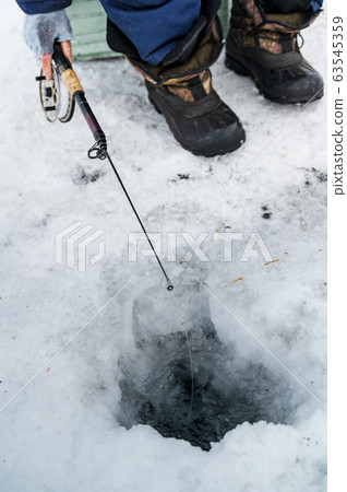 Fisherman on the Baikal lake in Siberia Fisherman on the Baikal lake in Siberia 63545359
