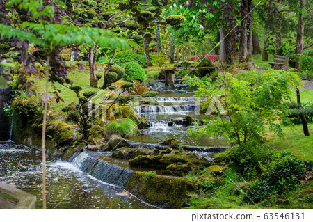 Cascade of small waterfalls in japanese garden at Cascade of small waterfalls in japanese garden at 63546131