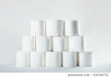 Stacked tower of soft toilet paper rolls on white Stacked tower of soft toilet paper rolls on white 63546752