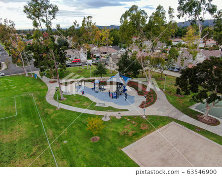 Aerial view of large-scale residential neighborhood with small park, Irvine, California Aerial view of large-scale residential neighborhood with small park, Irvine, California 63546900