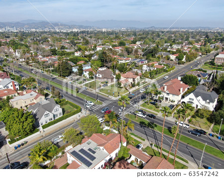 Aerial view of wealthy area with big houses in Central Los Angeles  63547242