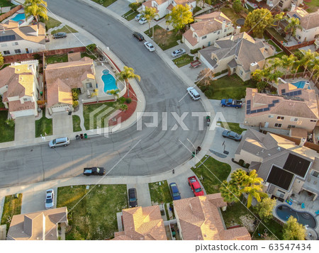 Aerial view of Menifee neighborhood, residential subdivision vila during sunset. Aerial view of Menifee neighborhood, residential subdivision vila during sunset. 63547434