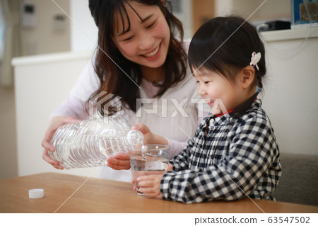 Parents drinking water Parents drinking water 63547502