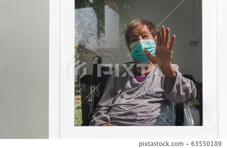 Elderly woman Self-isolation and self-quarantine at home 63550189