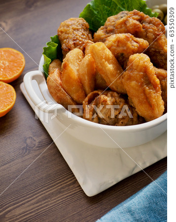 Korean chicken gangjung and fried potatoes 63550309