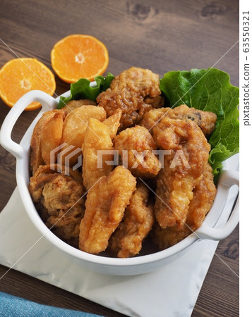 Korean chicken gangjung and fried potatoes 63550321