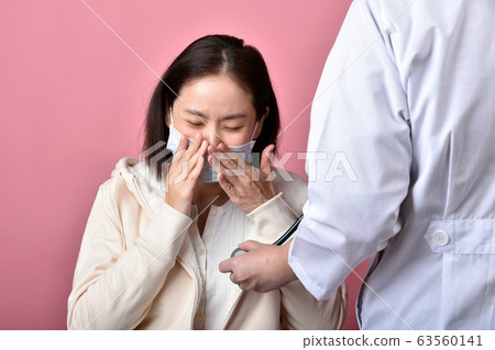 Asian woman have sore throat allergy and coughing 63560141