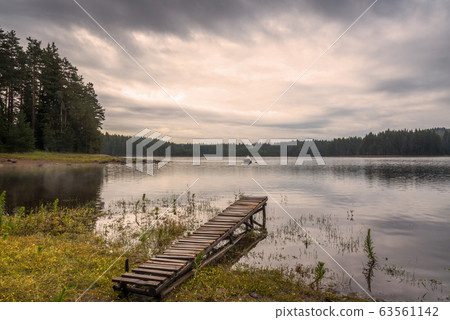 Lake sunrise Beautiful sunrise view of Shiroka Lake sunrise Beautiful sunrise view of Shiroka 63561142