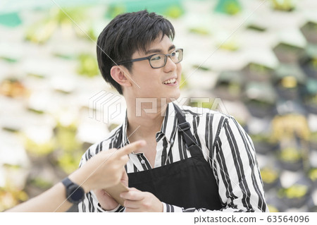 A young man who had an apron A young man who had an apron 63564096