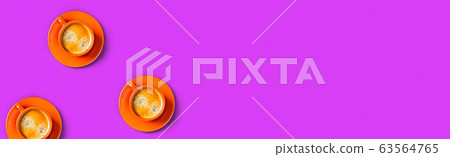 One cup of coffee on purple background. One cup of coffee on purple background. 63564765