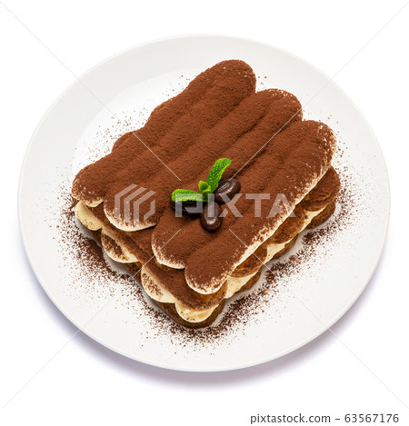 Classic tiramisu dessert on ceramic plate isolated on white background with clipping path Classic tiramisu dessert on ceramic plate isolated on white background with clipping path 63567176