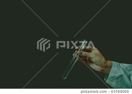 Researchers, doctors or inspectors with test tubes Researchers, doctors or inspectors with test tubes 63568008