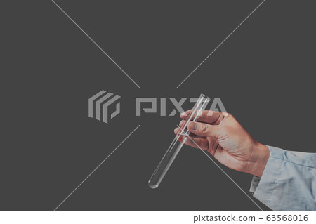 Researchers, doctors or inspectors with test tubes 63568016