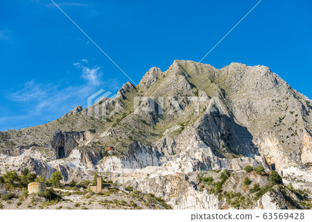 Apuan Alps Italy - Famous quarries of white Carrara marble 63569428