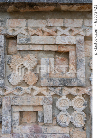 Fragment of the house of the Doves (Casa de las Palomas). Uxmal an ancient Maya city of the classical period. Travel photo. Yucatan. Fragment of the house of the Doves (Casa de las Palomas). Uxmal an ancient Maya city of the classical period. Travel photo. Yucatan. 63572423