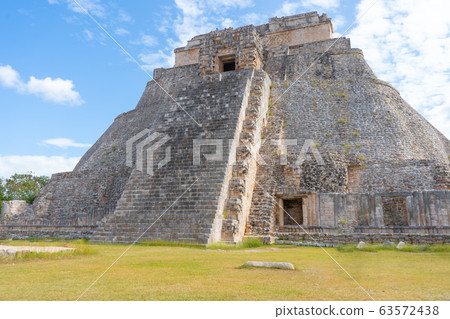 The Adivino (the Pyramid of the Magician or the Pyramid of the Dwarf). Uxmal an ancient Maya city of the classical period. Travel photo. Yucatan. 63572438