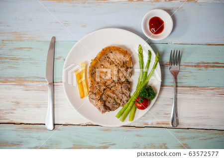 pork steak is cooked pork steak is cooked 63572577