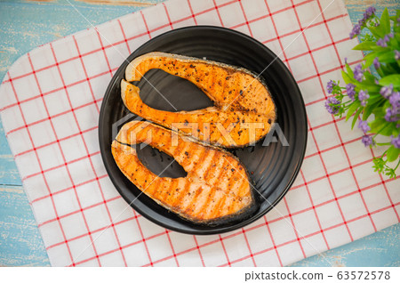 Cooked salmon steaks Cooked salmon steaks 63572578