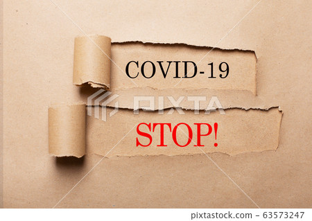 Covid-19 anti coronavirus creative concept. Words on paper Covid-19 anti coronavirus creative concept. Words on paper 63573247