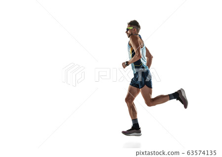 Triathlon male athlete running isolated on white studio background 63574135