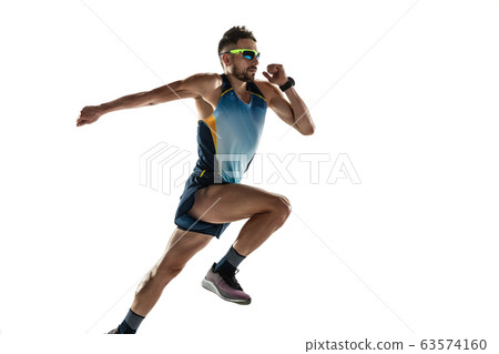 Triathlon male athlete running isolated on white studio background 63574160