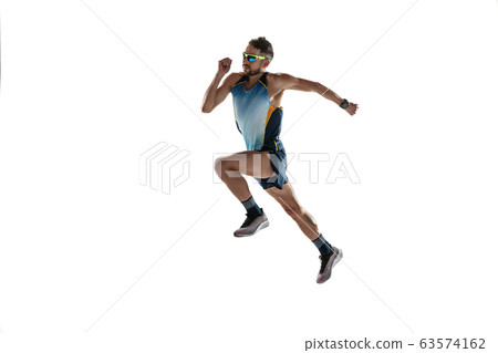 Triathlon male athlete running isolated on white studio background 63574162