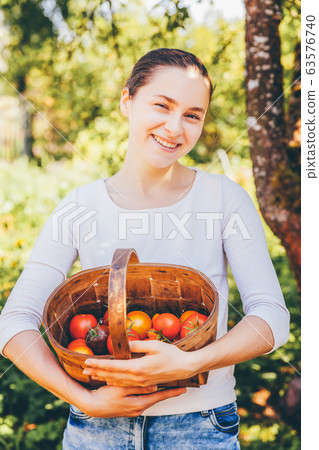 Gardening and agriculture concept. Young woman Gardening and agriculture concept. Young woman 63576740