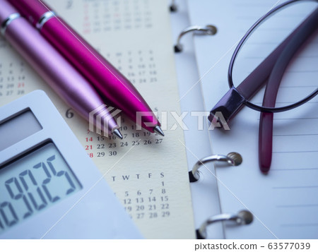 Business image, calendar, notebook, glasses, woman 63577039