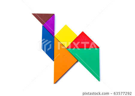 Color wood tangram puzzle in camel shape on white background 63577292