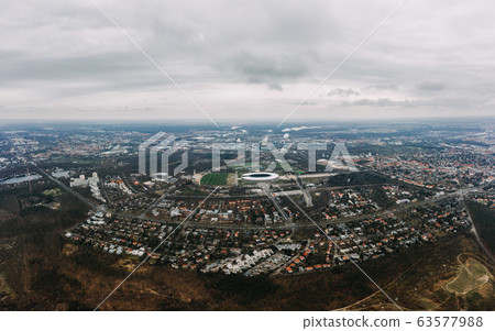 aerial photo of West part of Berlin with Olympic Stadium in cloudy weather aerial photo of West part of Berlin with Olympic Stadium in cloudy weather 63577988