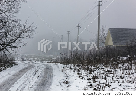 Rural road at the end of winter. Rural road at the end of winter. 63581063