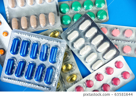 group of pharmaceutical medication and medicine pills in packs 63581644