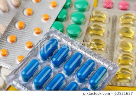 group of pharmaceutical medication and medicine pills in packs 63581657