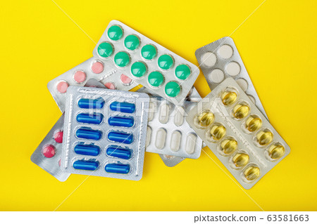 group of pharmaceutical medication and medicine pills in packs 63581663