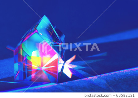 colorful glass prism house on trendy blue 63582151