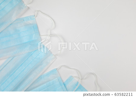 blue surgical medical masks on white background blue surgical medical masks on white background 63582211