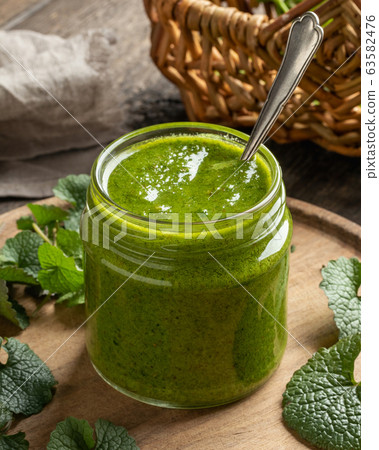 Pesto made from garlic mustard - a wild edible plant Pesto made from garlic mustard - a wild edible plant 63582476