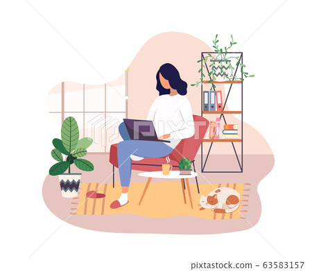 Freelancer working on laptop at home, remote job. 63583157