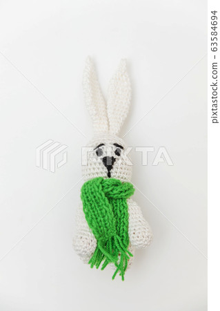 Simply minimal design with toy bunny in green Simply minimal design with toy bunny in green 63584694