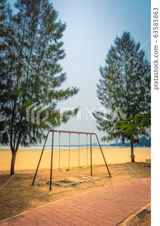 Public beach of Malacca city. 63585863