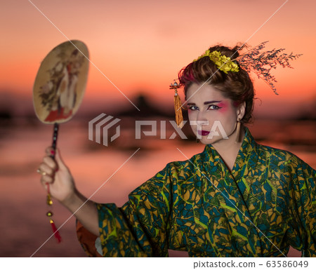 European woman in Geisha kimono 63586049