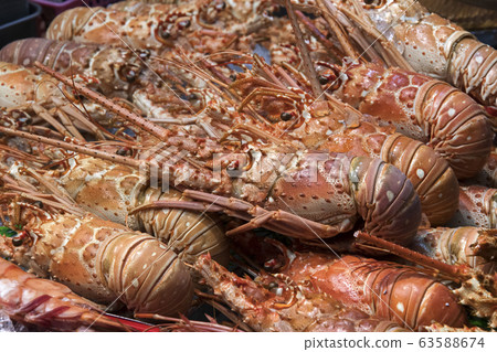 Fresh lobster sold at Kuromon market in Osaka city Fresh lobster sold at Kuromon market in Osaka city 63588674