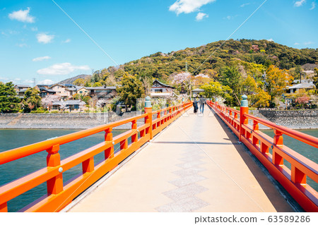 Uji town and river bridge at spring in Kyoto, Japan 63589286