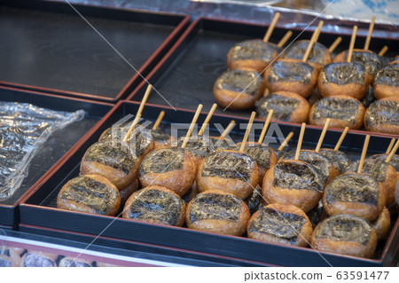 Traditional japanese grilled rice balls with 63591477