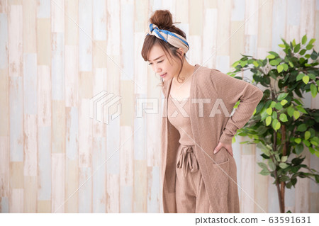 Woman in room wear Woman in room wear 63591631