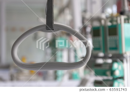 Hospital bed trapeze in intensive care unit in hospita 63591743