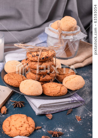 Plate of sweeties and jar of biscuits Plate of sweeties and jar of biscuits 63593054