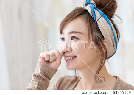 Woman in room wear Woman in room wear 63595199