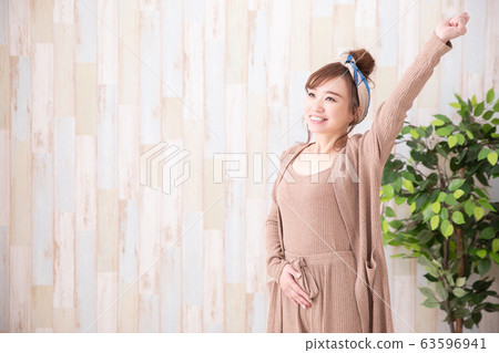 Woman in room wear Woman in room wear 63596941